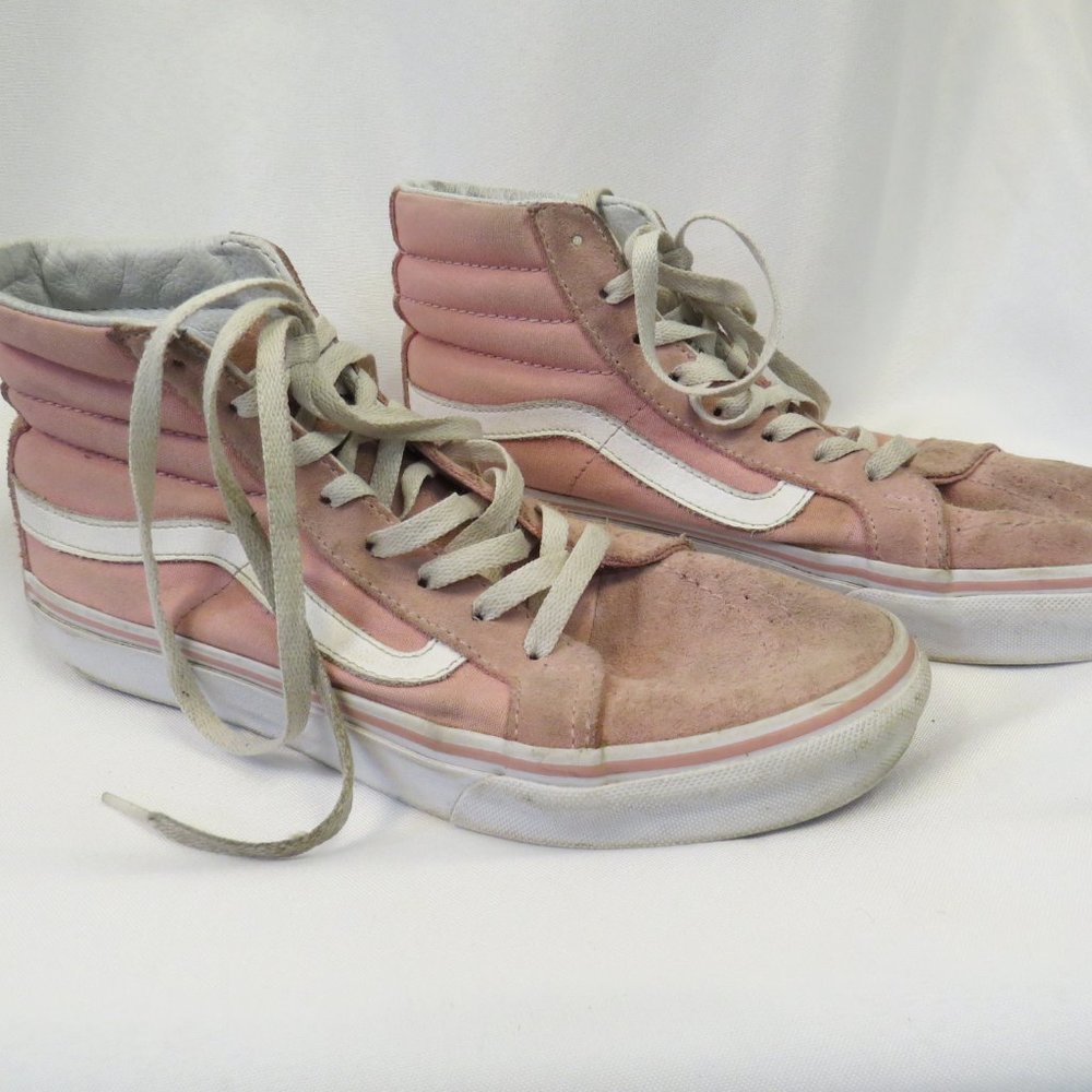 Pink high top Vans.